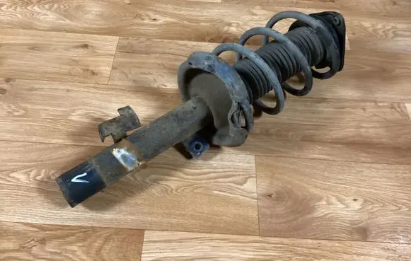 Ford Focus Front shock absorber with coil spring