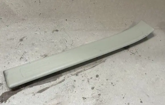 Rear sill trim cover