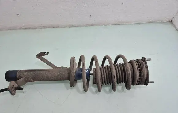 Ford Fiesta Front shock absorber with coil spring 