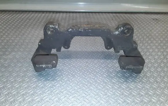 Volkswagen Touran I Front Brake Caliper Pad/Carrier 
