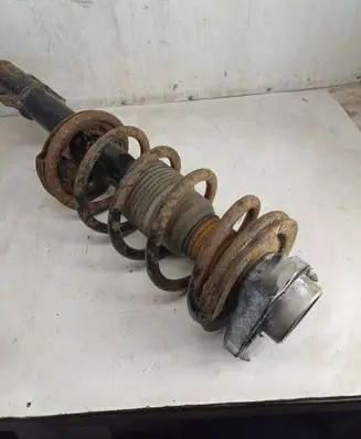 Front shock absorber with coil spring