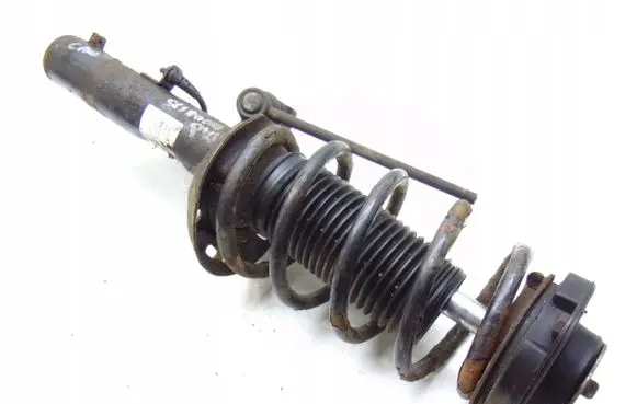 Volkswagen Scirocco Front shock absorber with coil spring