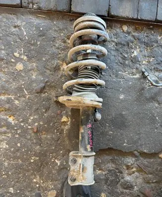 Opel Zafira B Front shock absorber with coil spring 999473021