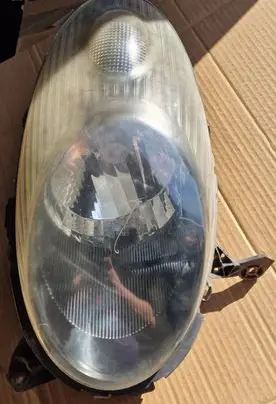 Nissan Micra Headlight/headlamp 89007481