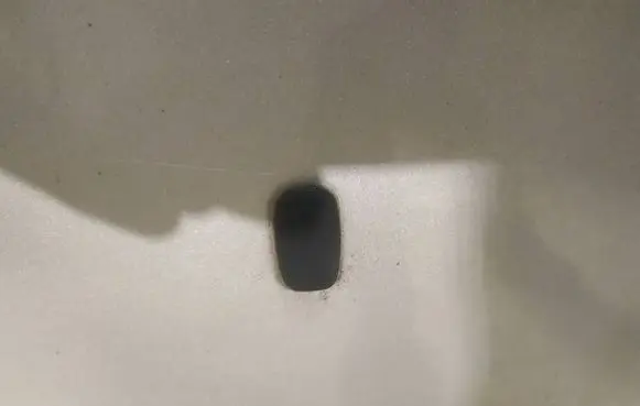 Windshield washer spray nozzle
