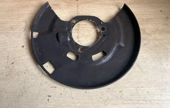 Opel Astra J Front brake disc dust cover plate 