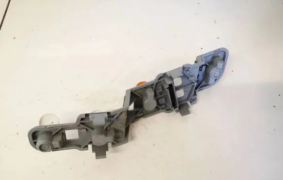 Tail light bulb cover holder