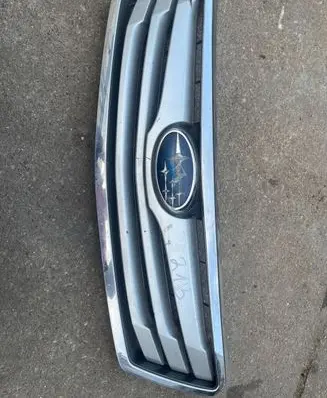 Subaru Legacy Front bumper upper radiator grill 91121aj020