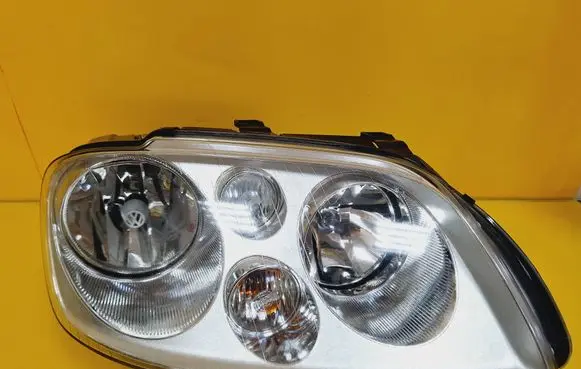 Volkswagen Touran I Headlight/headlamp 1T0941006R