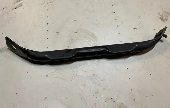 Radiator support slam panel bracket