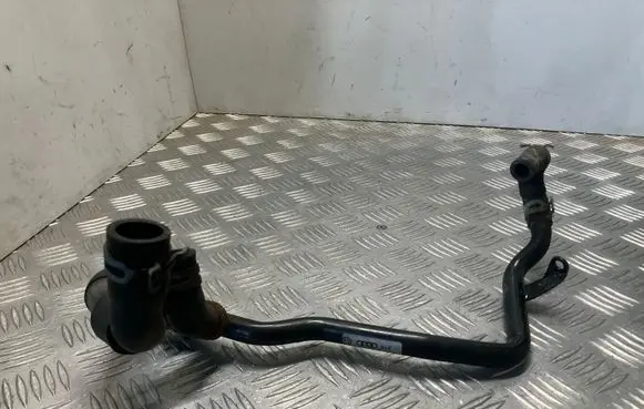 Volkswagen Golf VII Engine coolant pipe/hose 04L121064C