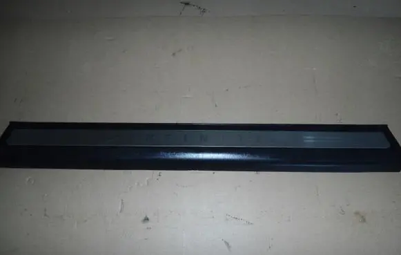Rear sill trim cover