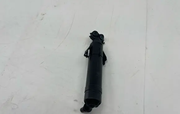Volkswagen PASSAT B7 Headlight washer spray nozzle 3AA955103