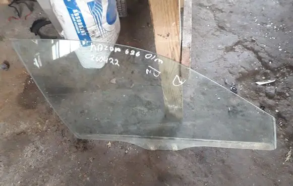 Mazda 626 Front door window glass four-door