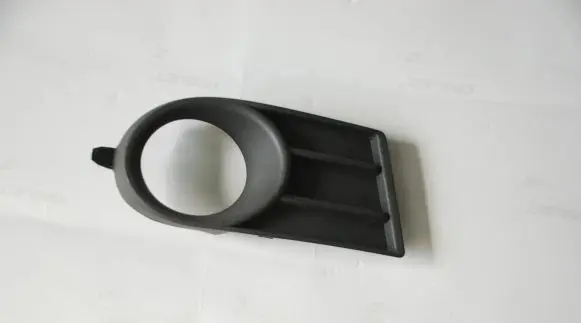 Suzuki Swift I Front fog light trim/grill