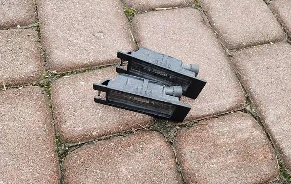 Opel Corsa E Number plate light 13251936