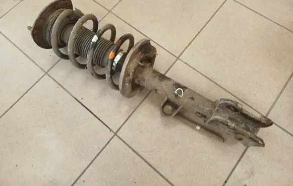 KIA Sorento Front shock absorber with coil spring 546602P500