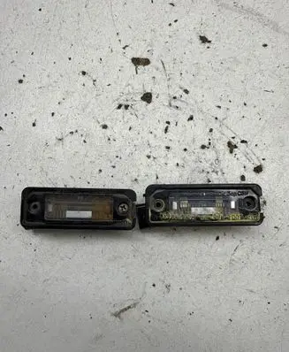 Volkswagen Golf V Number plate light 1J6943021B