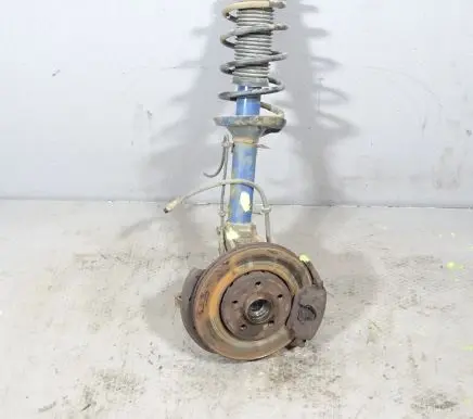 Front shock absorber with coil spring