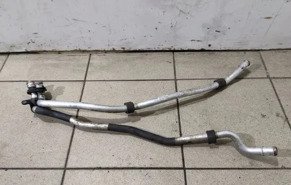 Volkswagen Touareg II Engine coolant pipe/hose 7P0819887B 7P0819912E