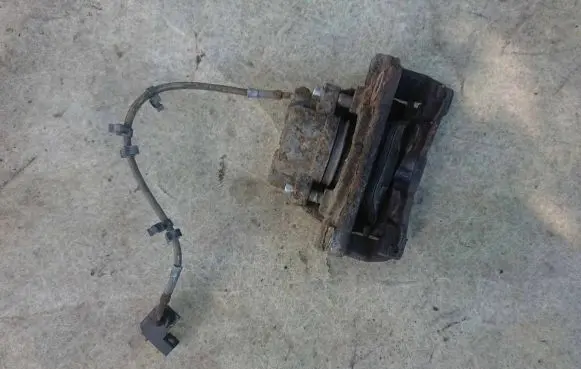 Jaguar XF X250 Front brake caliper