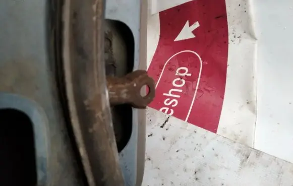 Rear door check strap stopper