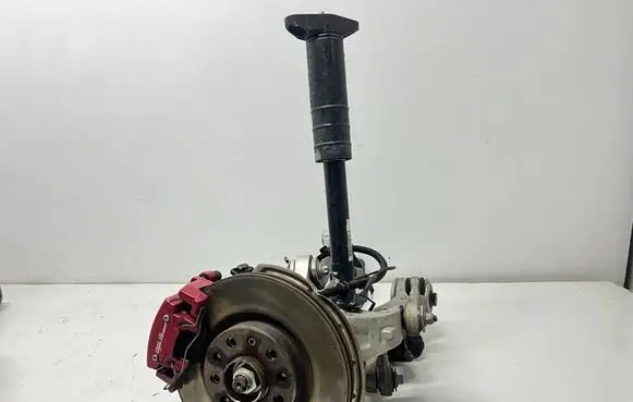 Rear wheel hub spindle/knuckle