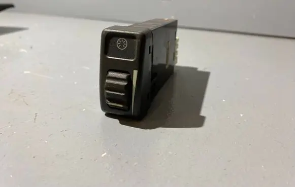 Panel lighting control switch