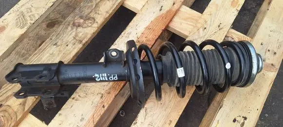 Front shock absorber with coil spring