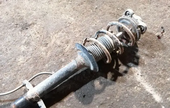 Peugeot Boxer Front shock absorber with coil spring