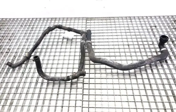 Volkswagen Golf VII Engine coolant pipe/hose 5Q0121619D