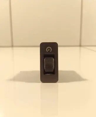 Panel lighting control switch