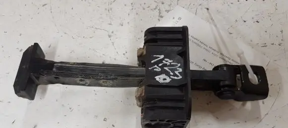 Front door check strap stopper