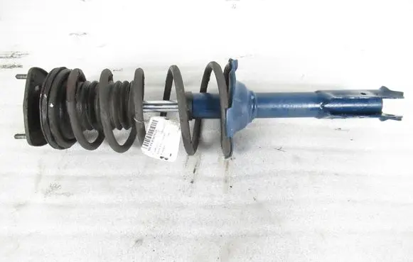 Toyota Yaris Front shock absorber with coil spring