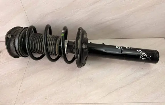 Volkswagen Touran III Front shock absorber with coil spring 