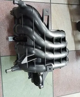 Volkswagen Golf IV Intake manifold 036129711BK