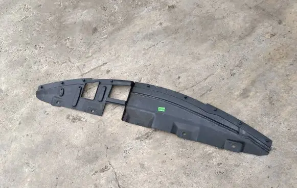 Engine bonnet/hood lock trim molding