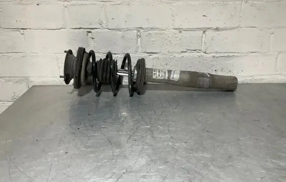 Front shock absorber with coil spring