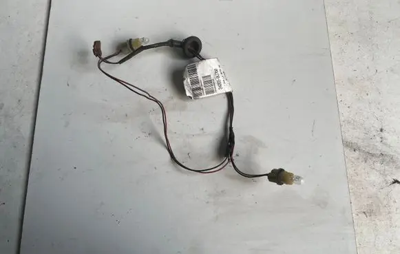 Nissan Almera Tino Number plate light 24055BU700