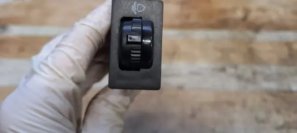 Headlight level height control switch