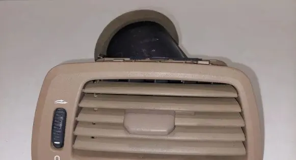 Dash center air vent grill