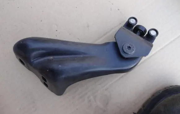 Ford Escort Sliding door upper roller guide/hinge ET76-A25028-AG