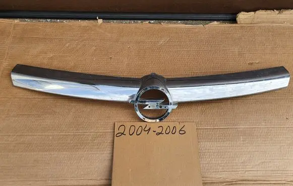 Opel Astra H Front bumper upper radiator grill 13142522 13142524