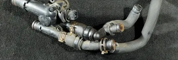 Thermostat/thermostat housing