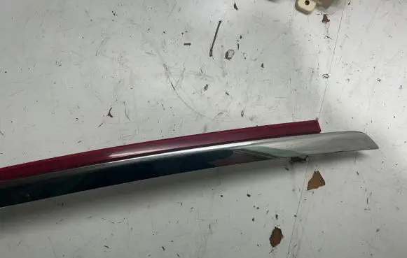KIA Sportage Rear light center trim bar blend 