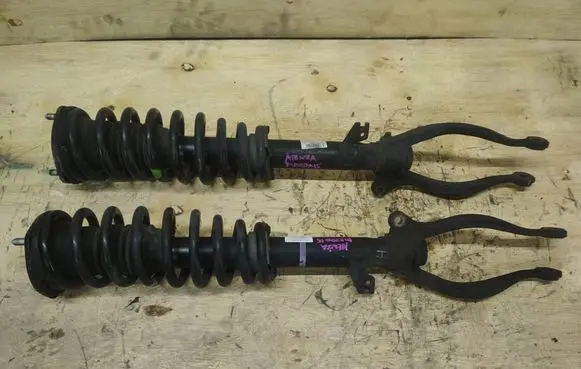 Front shock absorber with coil spring
