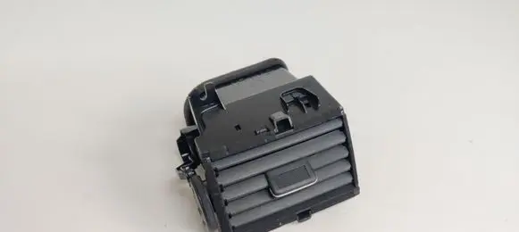 Nissan Pulsar Dash center air vent grill 687613ZP0A