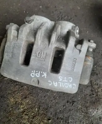 Cadillac CTS Front brake caliper 20808592 0887456