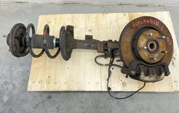 Mitsubishi Outlander Front shock absorber with coil spring