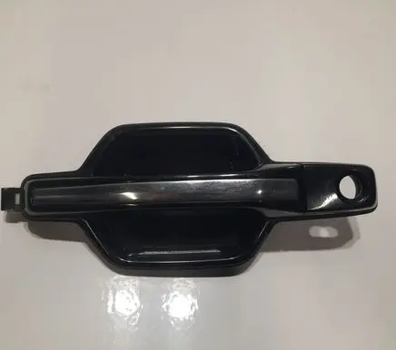 Mitsubishi Pajero Loading door exterior handle/bracket MR556247
